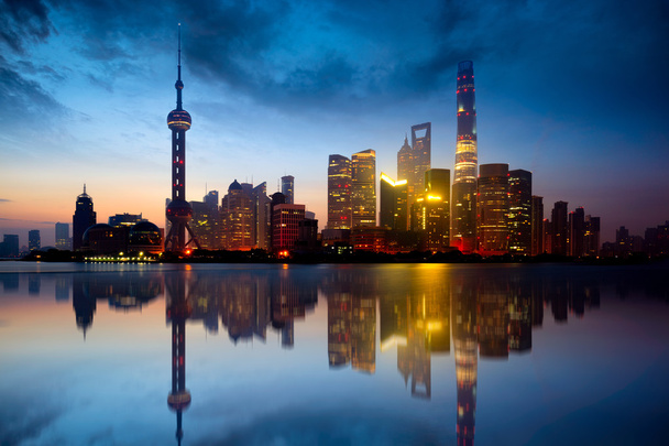 stock-photo-shanghai-skyline-cityscape-1735191001.jpg